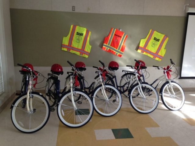 5 New bicycles and helmets, plus staff vests in bright colors