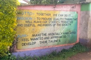 School Sign with Motto and Mission