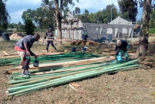 Roof supports being painted